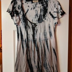 Oneworld top rayon and spandex. Very comfortable